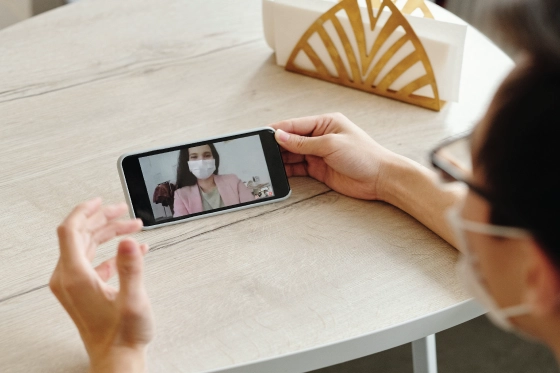 female-patient-taking-telehealth-service